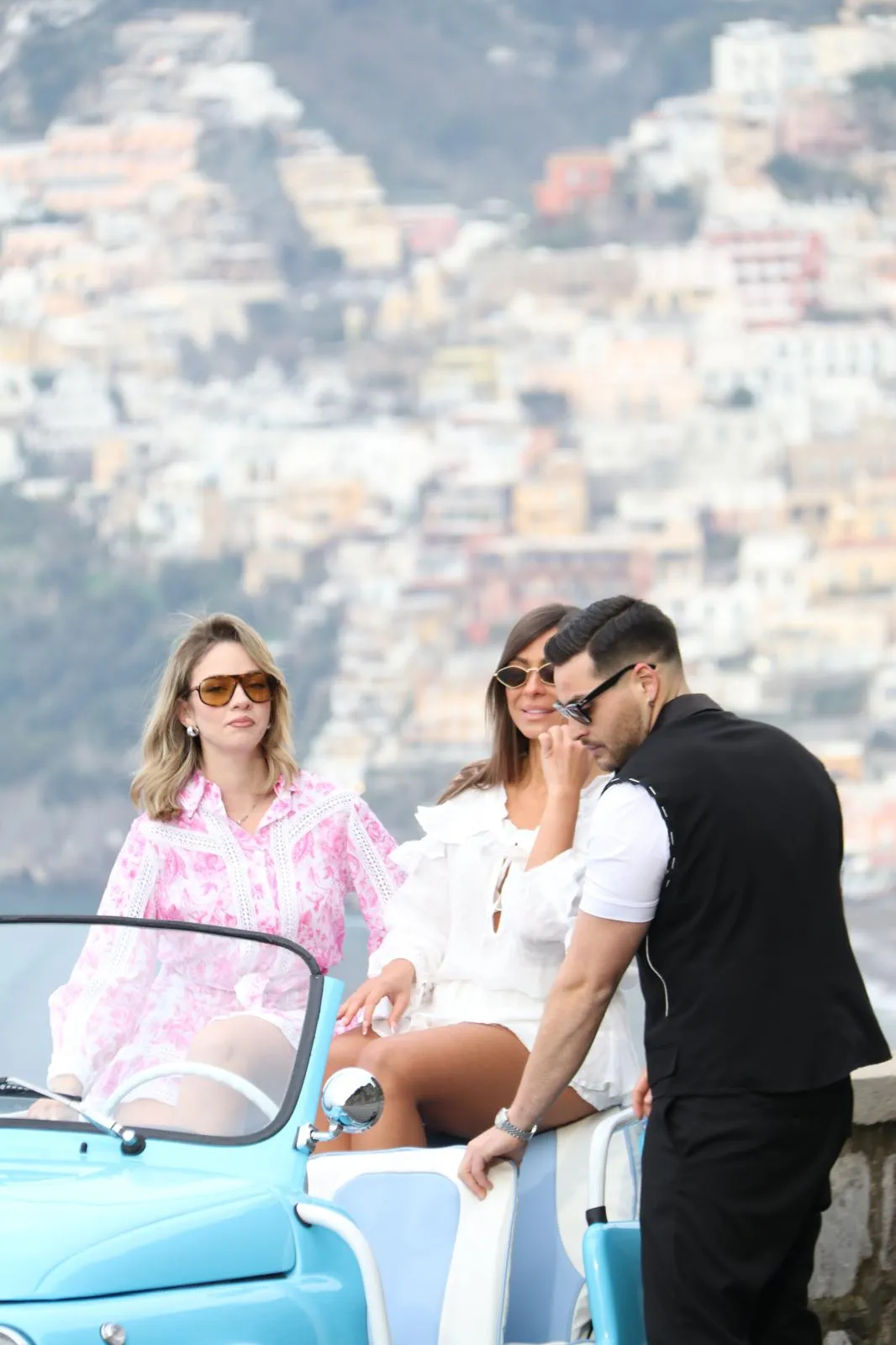 Group photo in the open-top Fiat 500 Jolly with Amalfi Coast backdrop